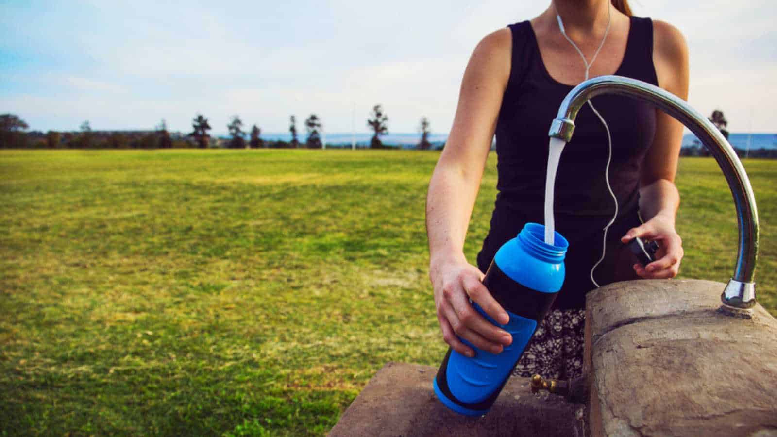 Filling water in bottle