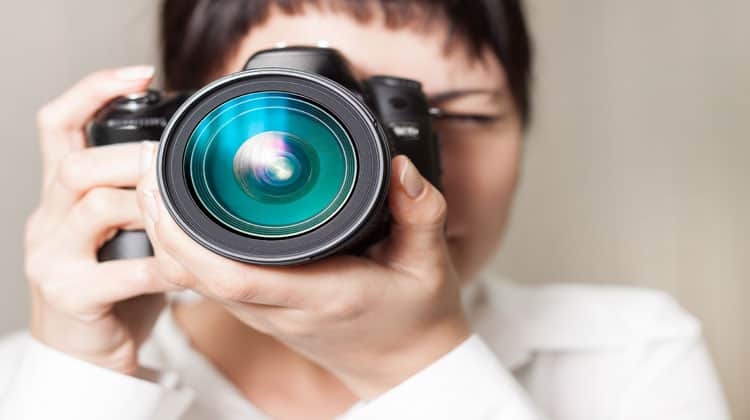 woman taking photograph