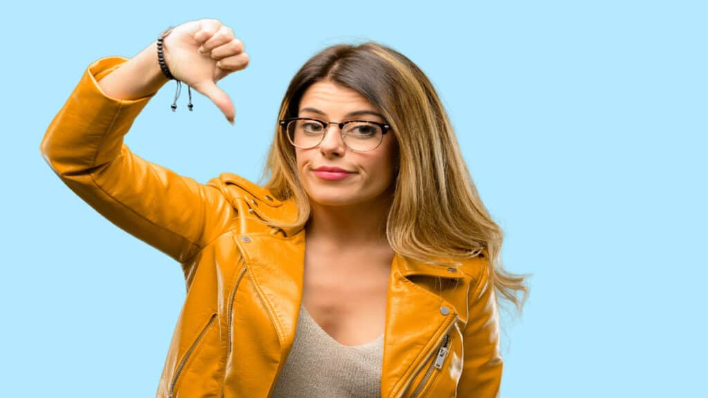 woman with thumbs down